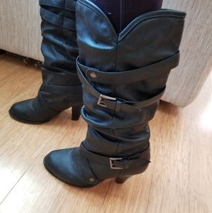 Black strappy heeled boots